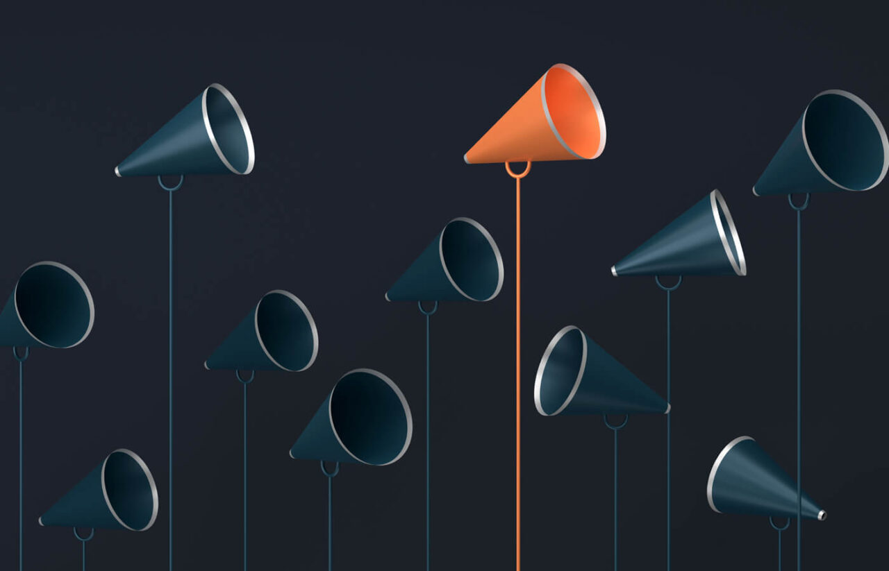 Abstract illustration of megaphones, with one bright orange megaphone standing out from the crowd.